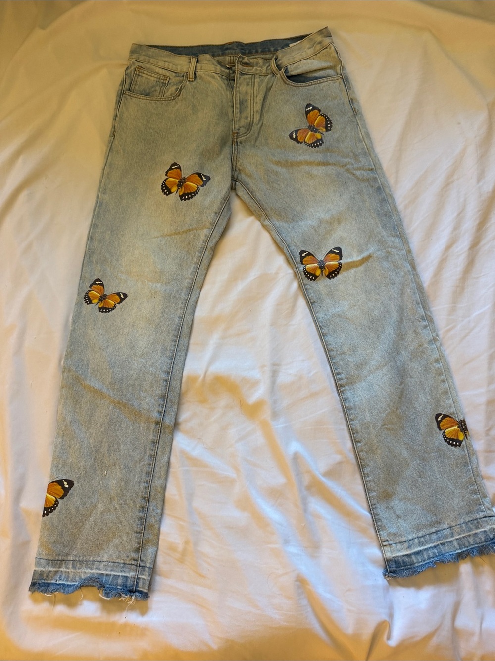 Mnml Light Wash Denim Jeans with Orange Butterfly Patches
